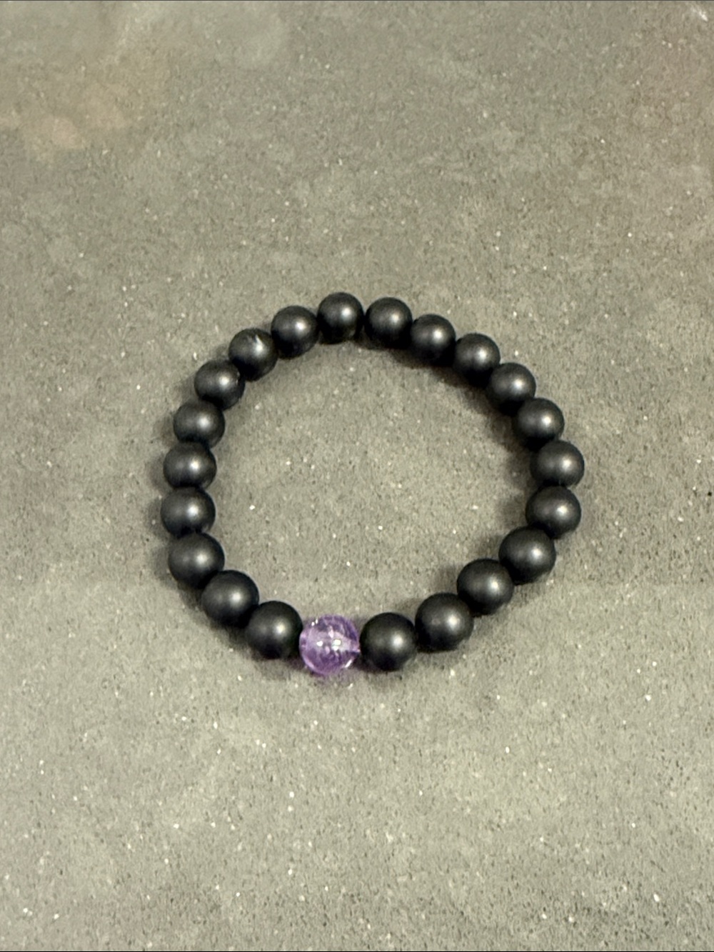 Black Beaded Stretch Bracelet with Purple Accent Bead
